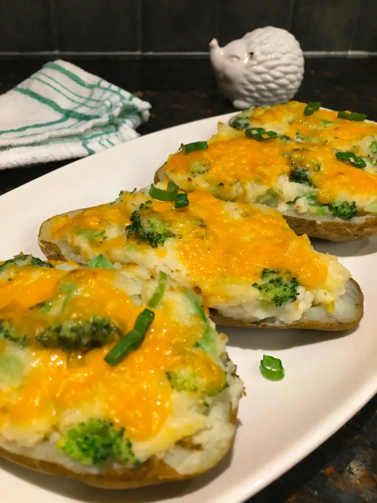 Broccoli Cheddar Twice Baked Potatoes on a white plate