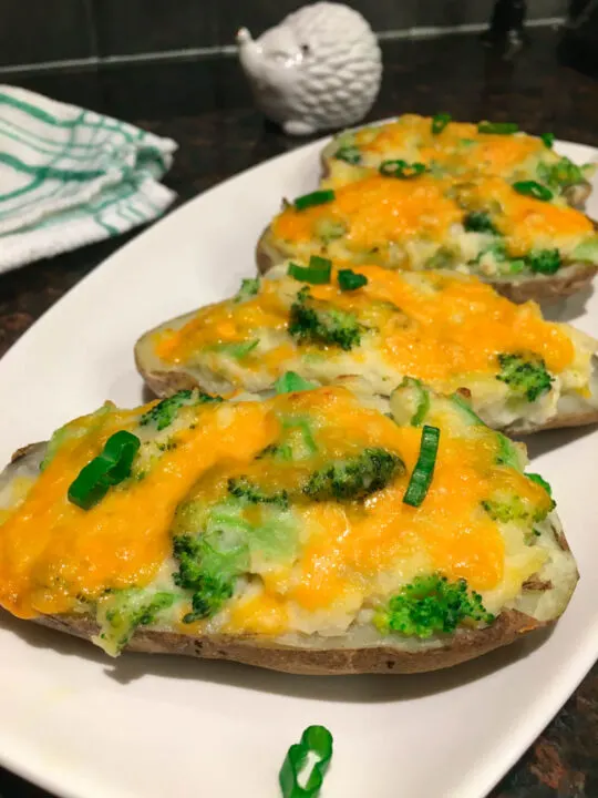 Broccoli Cheddar Twice Baked Potatoes on a white plate