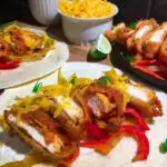 buffalo chicken fajita dinner plated on a wood board