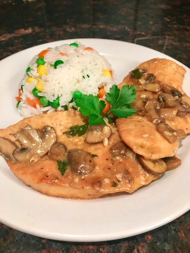 chicken marsala recipe plated with rice