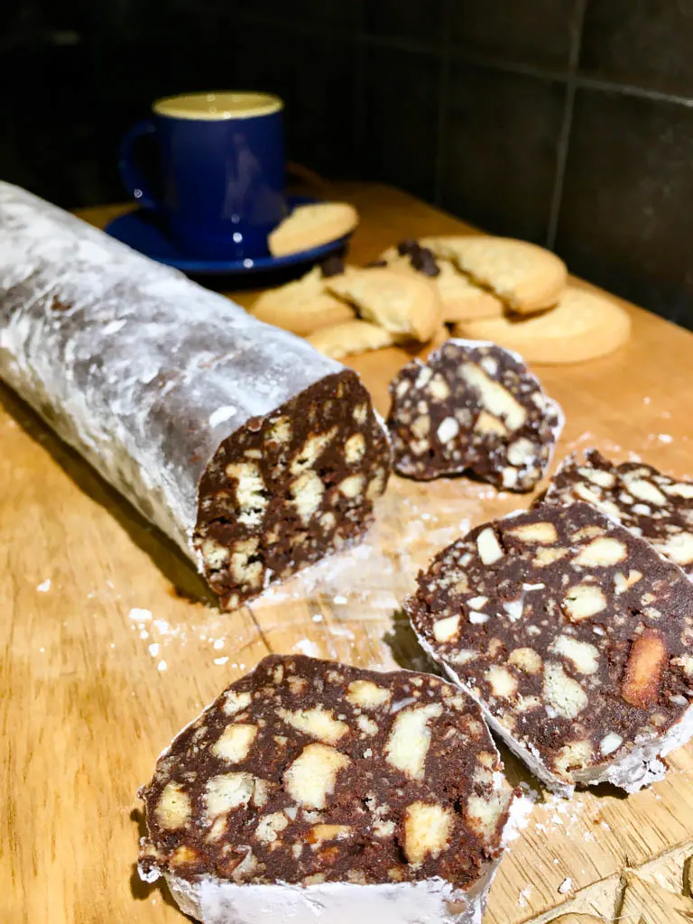 Chocolate Salami plated on a wood board