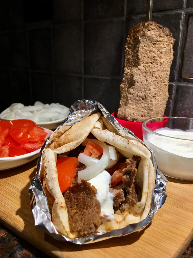 Halifax donair wrap and skewer with tomatoes, onions and donair sauce