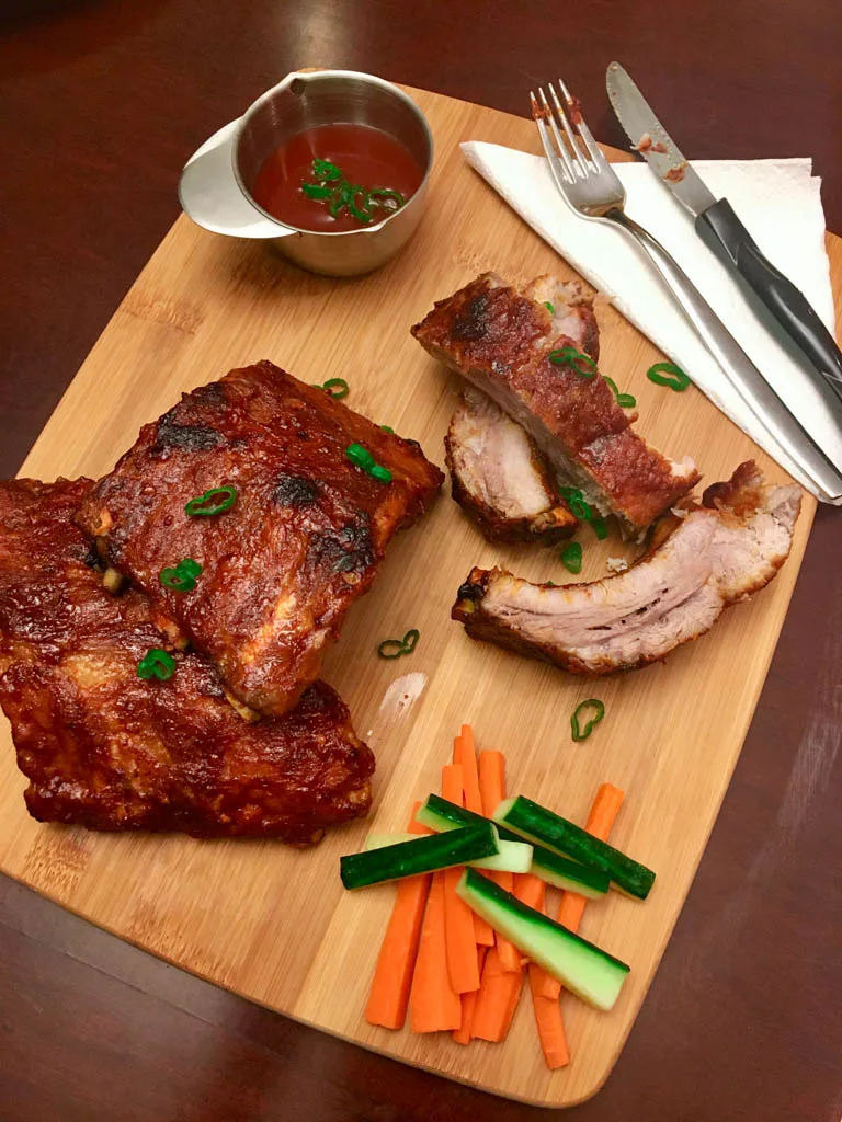 Instant Pot Ribs Recipe plated on wood board