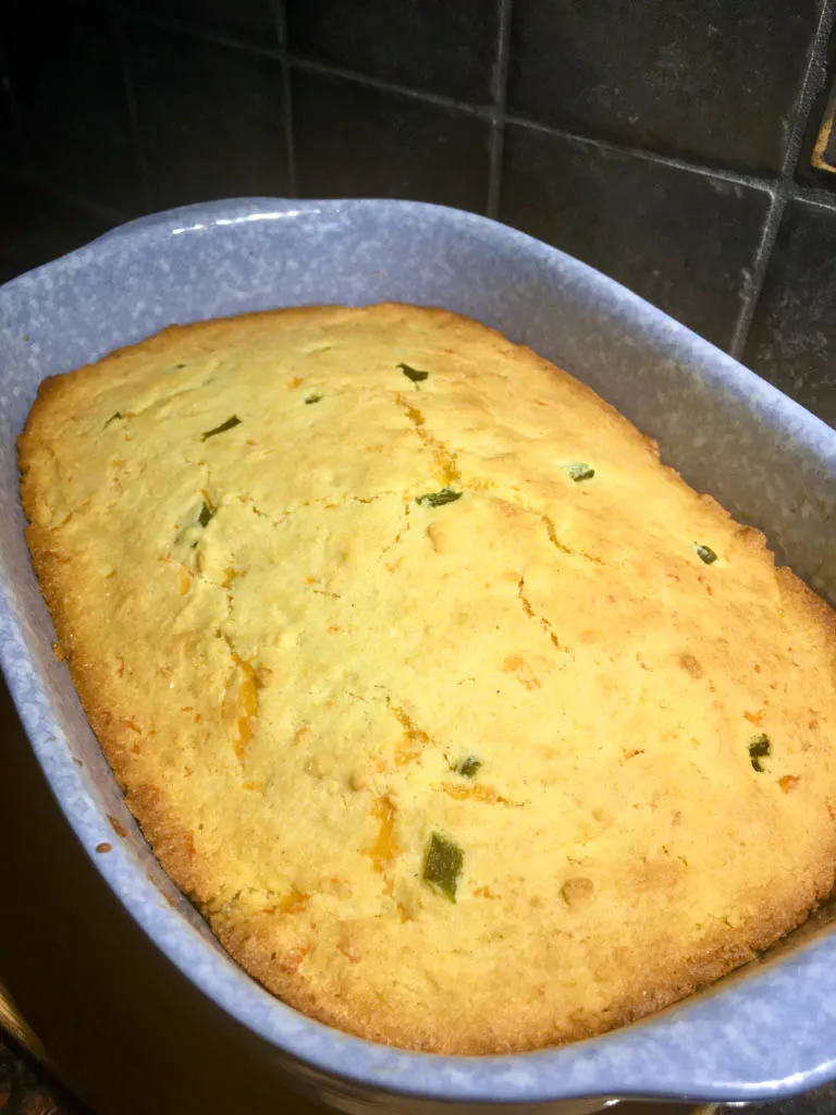 jalapeno cheddar corn bread baked in a blue dish