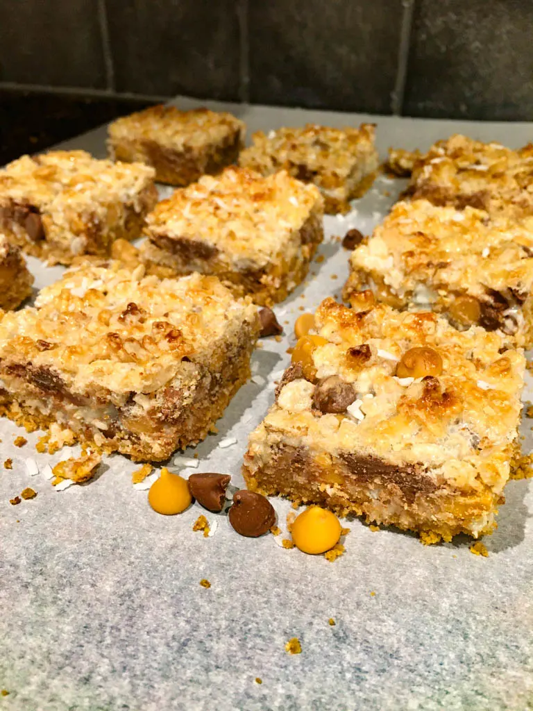 Magic Bars 8 Layer bars on parchment paper