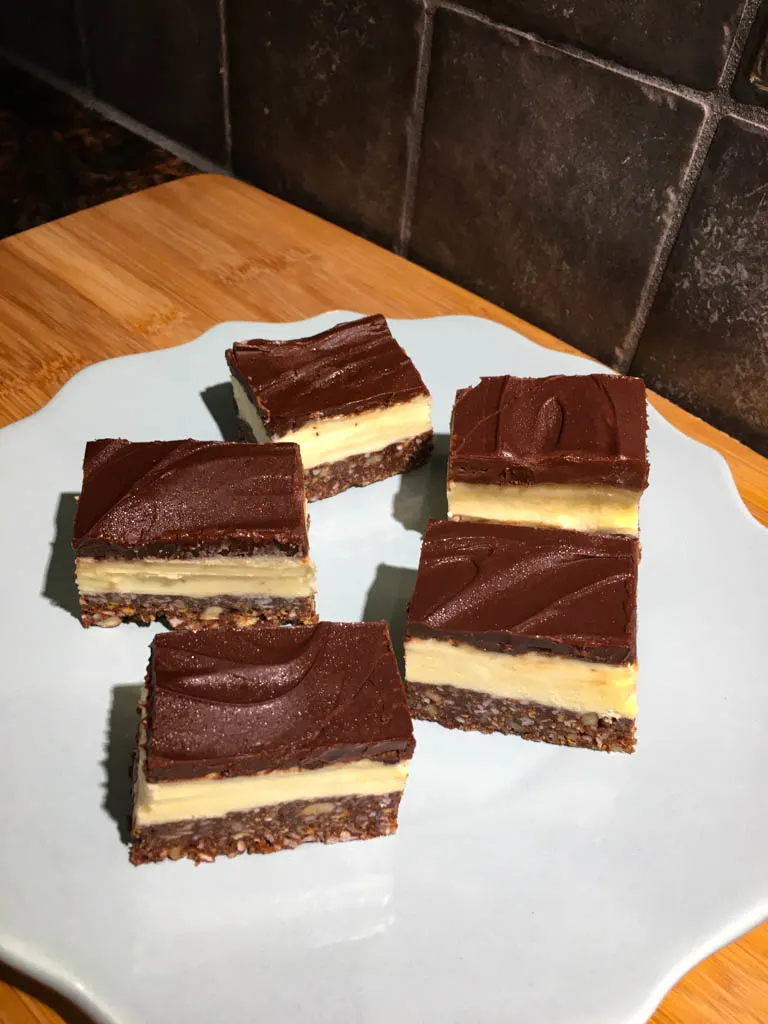 Nanaimo Bars plated on a white plate