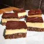 Nanaimo Bars plated on a white plate