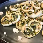 spinach feta palmiers on a metal plate