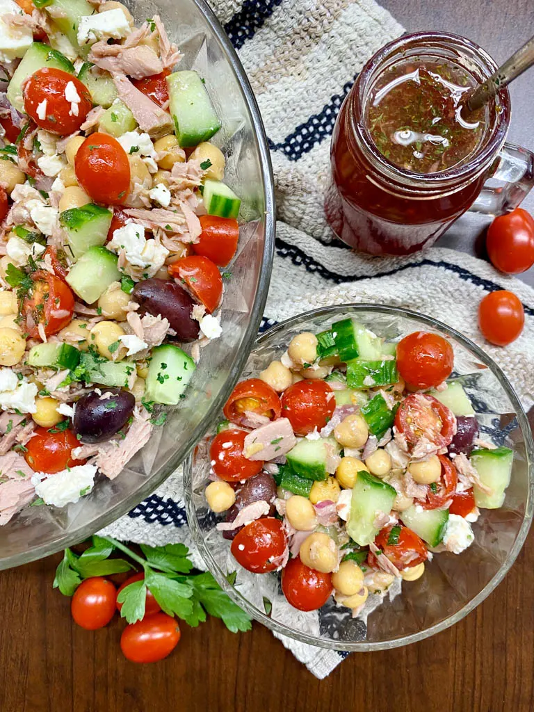 greek chickpea tuna salad in a glass bowl