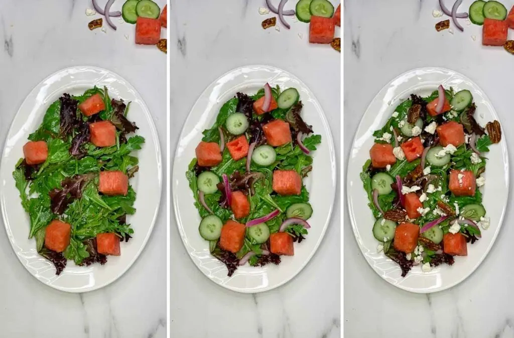 plating watermelon salad on a white platter