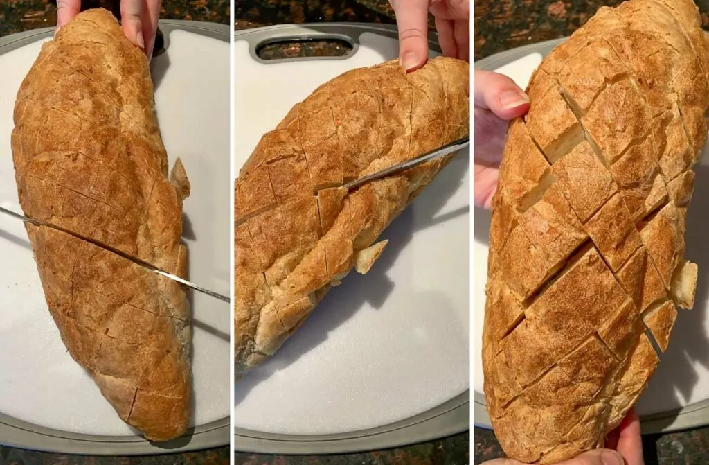 slicing a loaf of bread to make pull apart jalapeno popper garlic bread