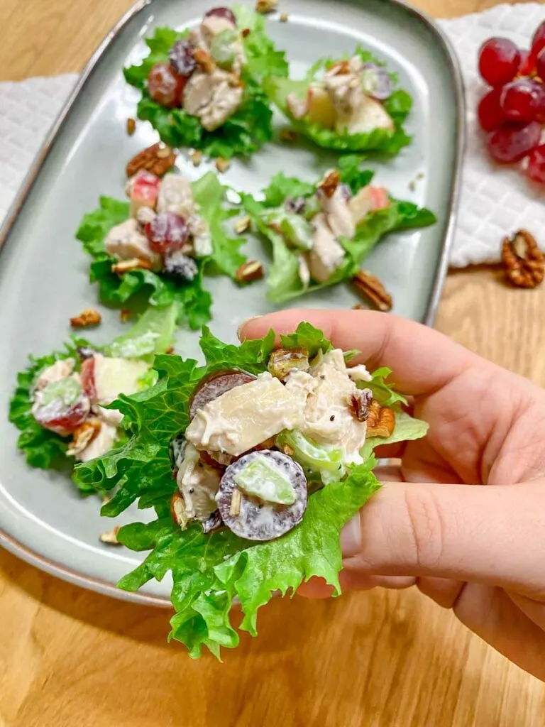 chicken waldorf salad in lettuce wraps on a plate