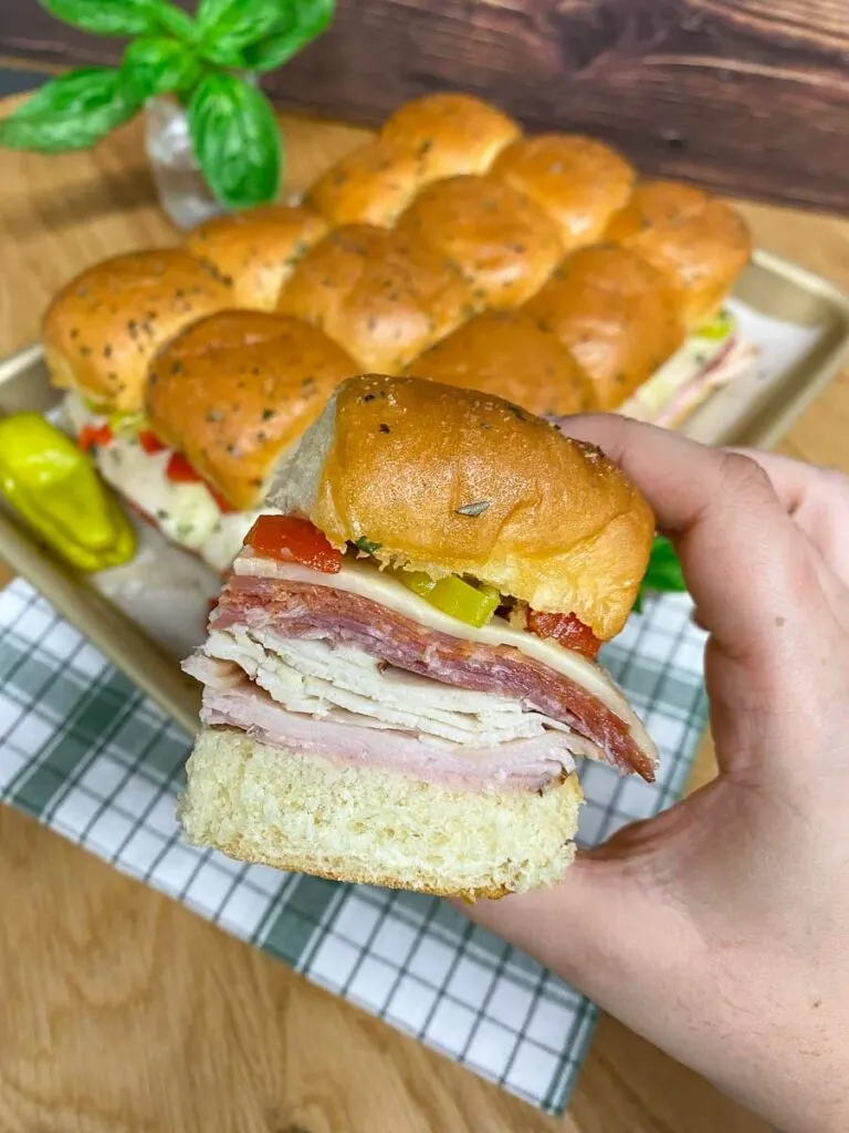 Italian sliders on a sheet pan with parchment paper