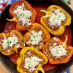 stuffed peppers in a cast iron skillet