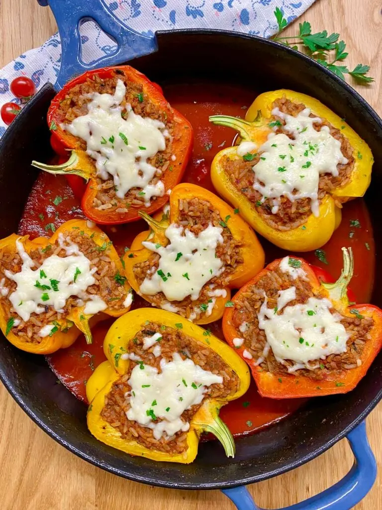 stuffed peppers in a cast iron skillet