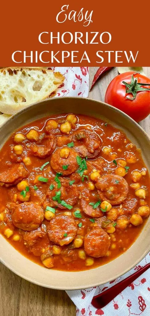 chorizo chickpea stew in a brown bowl garnished with parsley