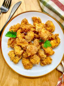 copycat kfc popcorn chicken on a white plate
