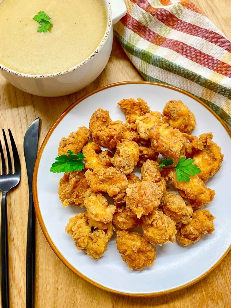 copycat kfc popcorn chicken on a white plate