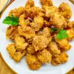 copycat kfc popcorn chicken on a white plate