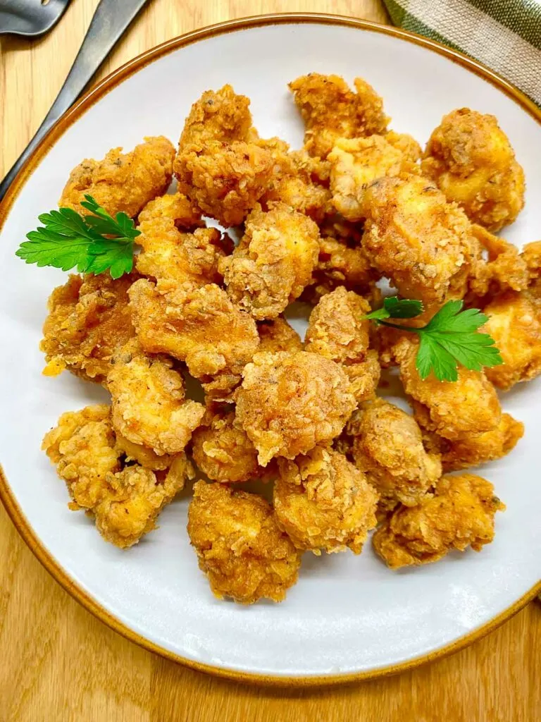 copycat kfc popcorn chicken on a white plate