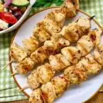 chicken souvlaki on a white plate