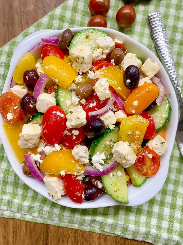 greek salad in a white bowl