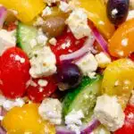 greek salad in a white bowl
