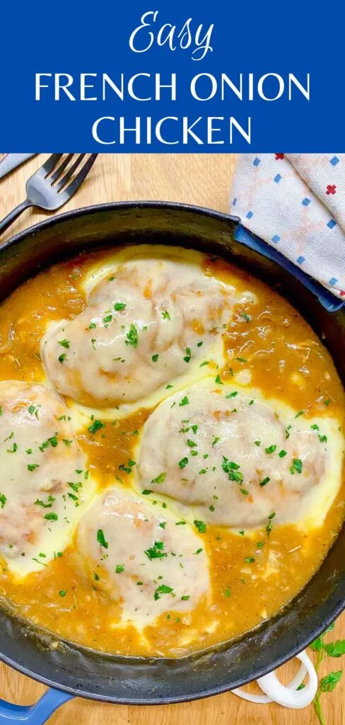 French onion chicken in a cast iron skillet garnished with parsley