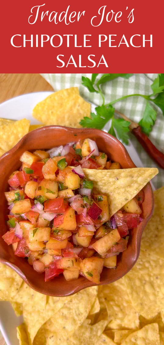 a bowl of chipotle peach salsa is served on a platter with tortilla chips. text overlay shows the recipe name 'trader Joe's chipotle peach salsa'