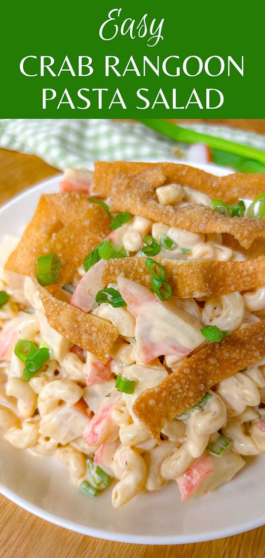 a white bowl is filled with crab rangoon pasta salad topped with crispy wonton strips and green onions. text overlay reads 'easy crab rangoon pasta salad'