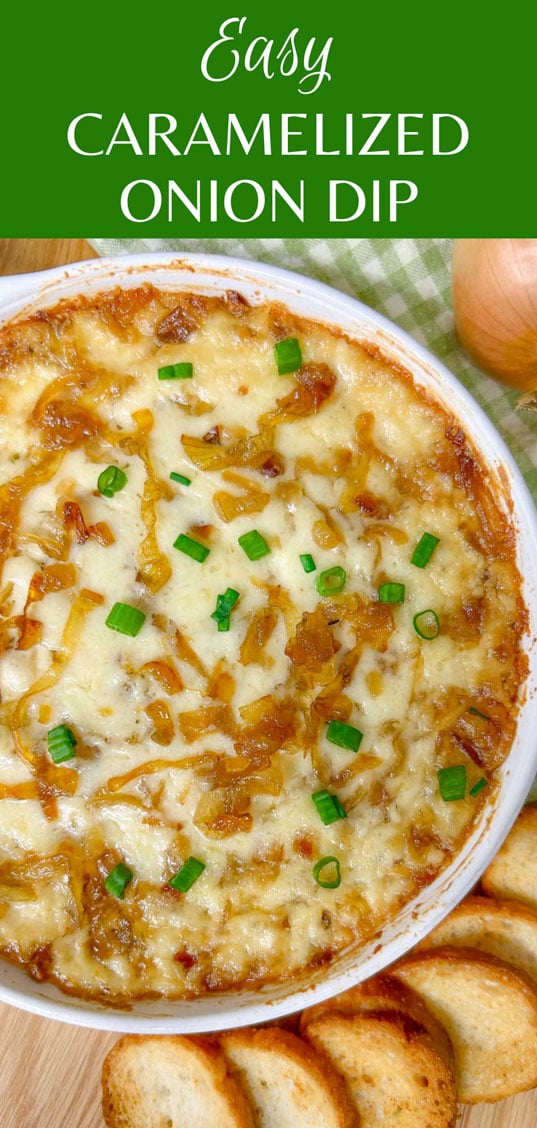 a white dish is filled with baked caramelized onion dip and garnished with green onions