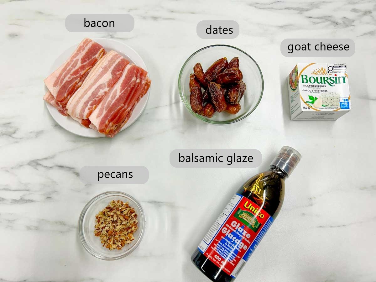 a kitchen counter with the ingredients to make boursin stuffed dates with text overlay reading bacon, dates, goat cheese, pecans, and balsamic glaze