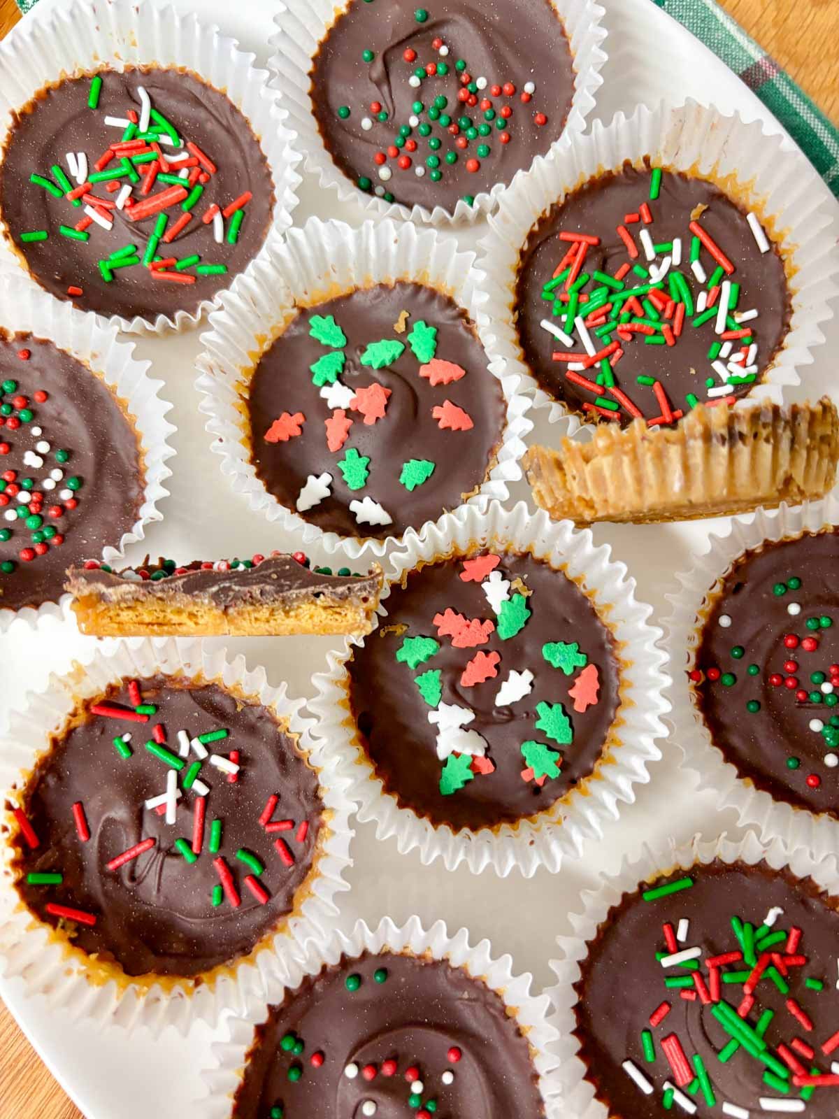  white platter is filled with Christmas crack cookies.