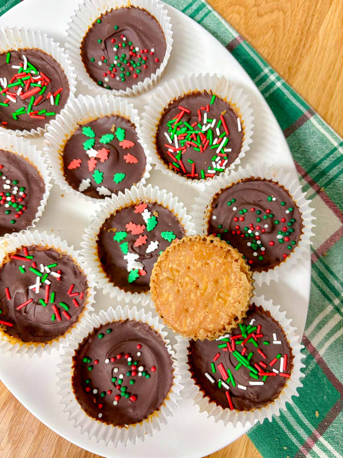  white platter is filled with Christmas crack cookies.