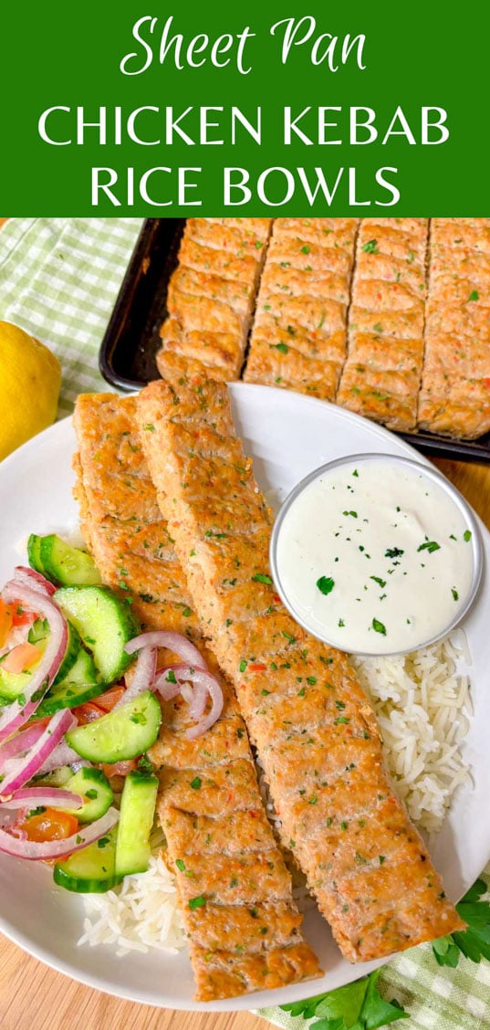 a plate is topped with pita bread, two chicken kebabs, cucumber salad, and a ramekin of garlic sauce.