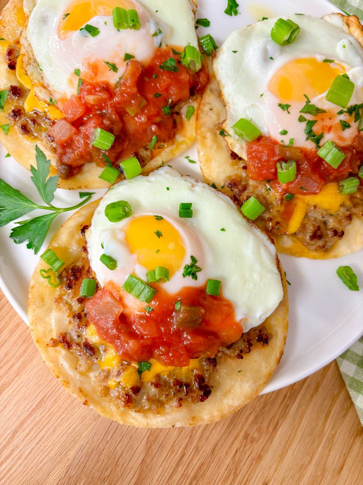 close up shot of one of the breakfast tacos and two in the background