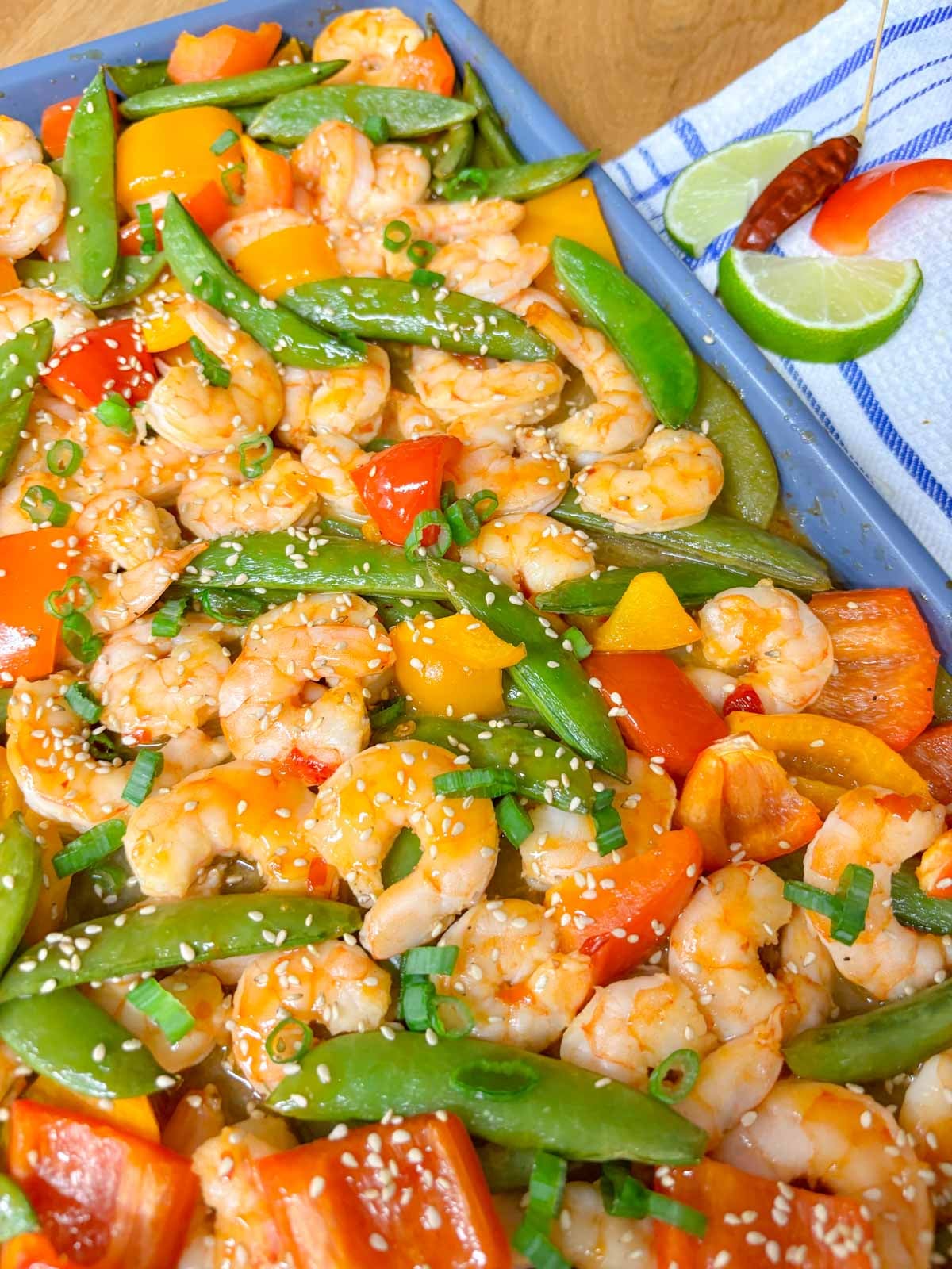 close up of roasted shrimp and veggie sheet pan meal
