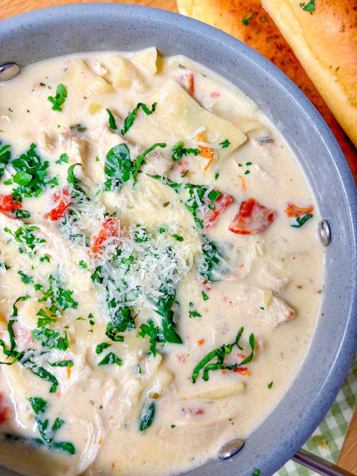 a pot of white chicken lasagna soup