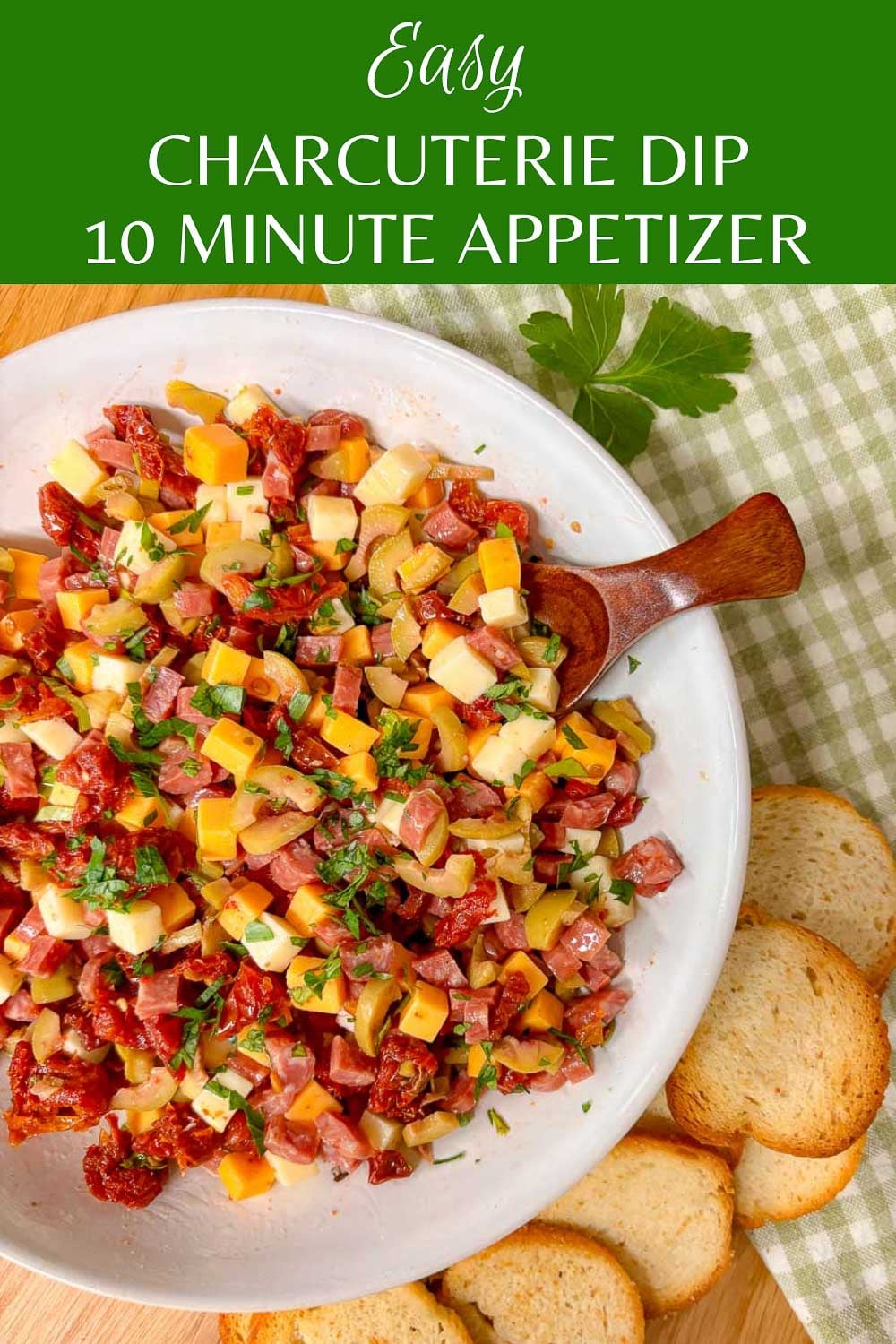 pinterest image with the charcuterie dip in a bowl and the recipe name as text overlay