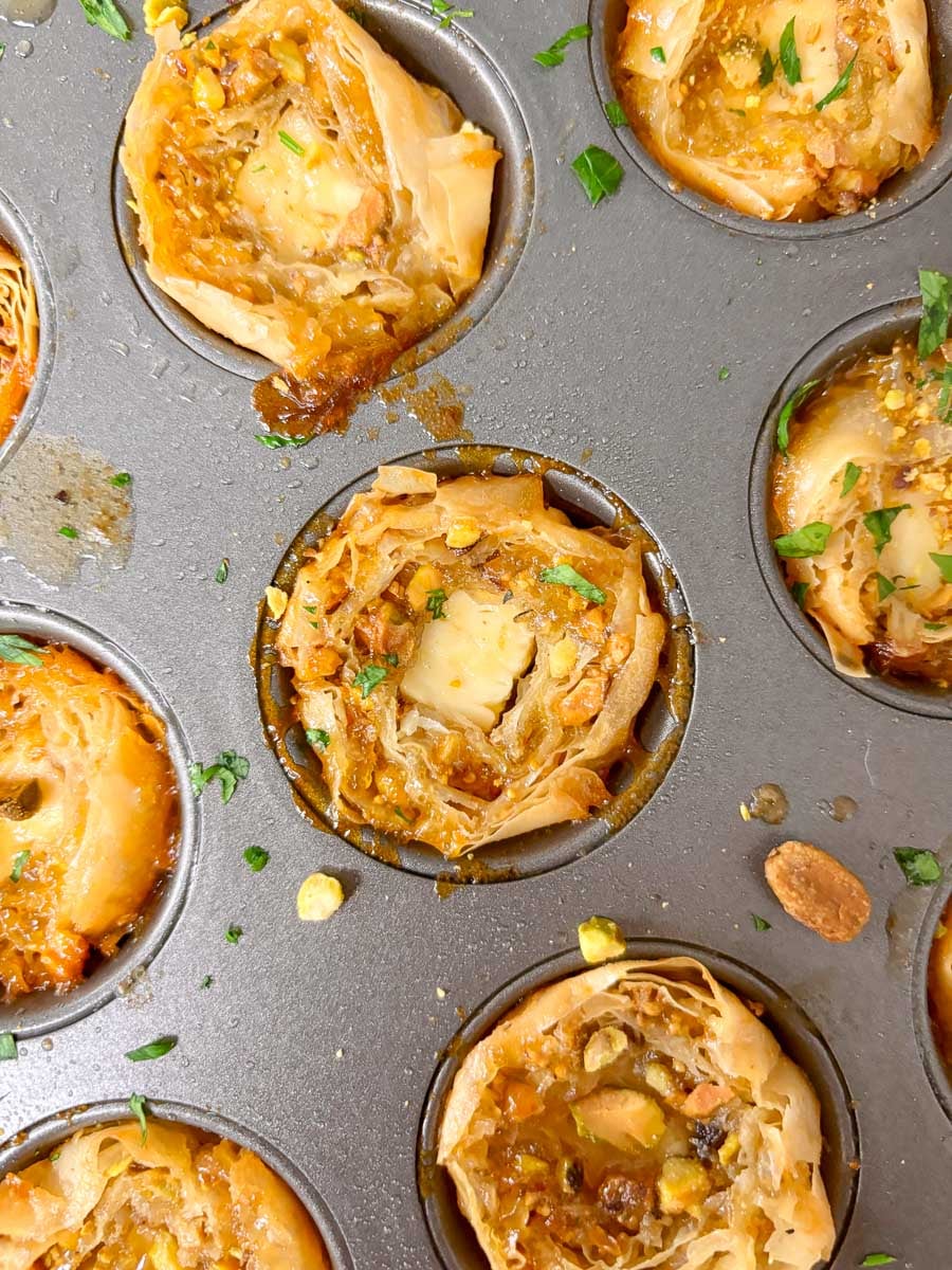 close up shot of a feta bite in a mini muffin tin